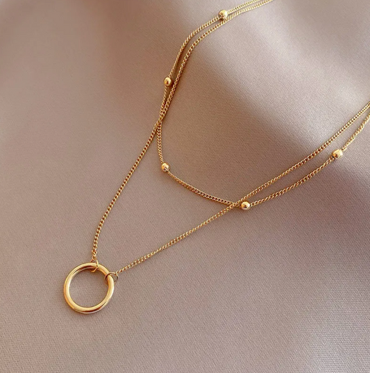 Collar doble dorado de 18 quilates con anillo